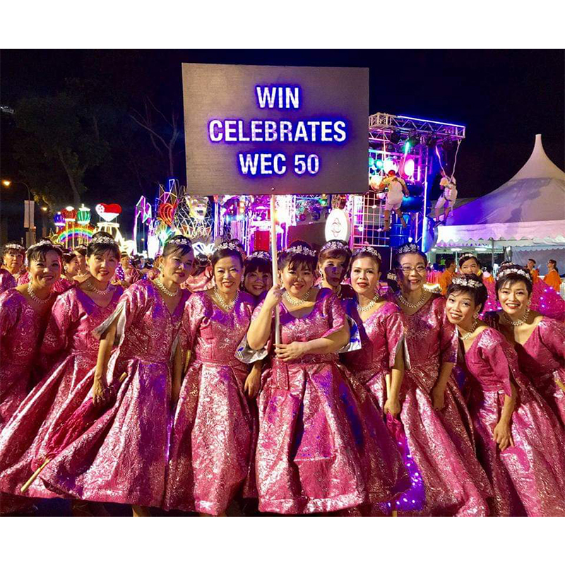 Iris Lim Leads People's Association's Women's Integration Network Travelling Dance Contingent Chingay Parade