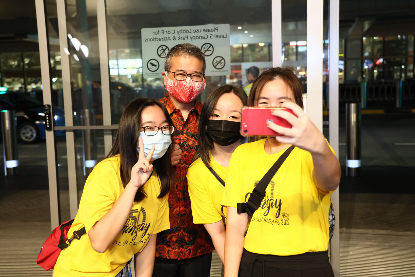 Deputy Chairman Edwin Tong Takes A Group Selfie With Volunteers